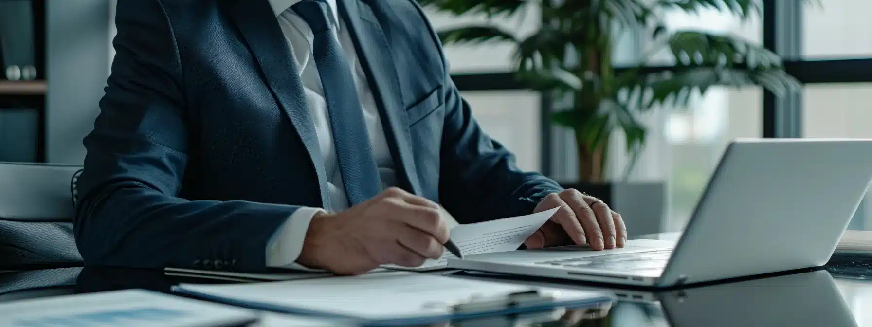 a confident consultant in professional attire conducting a cybersecurity assessment with a laptop and cmmc certification documents spread out on a sleek, modern desk.