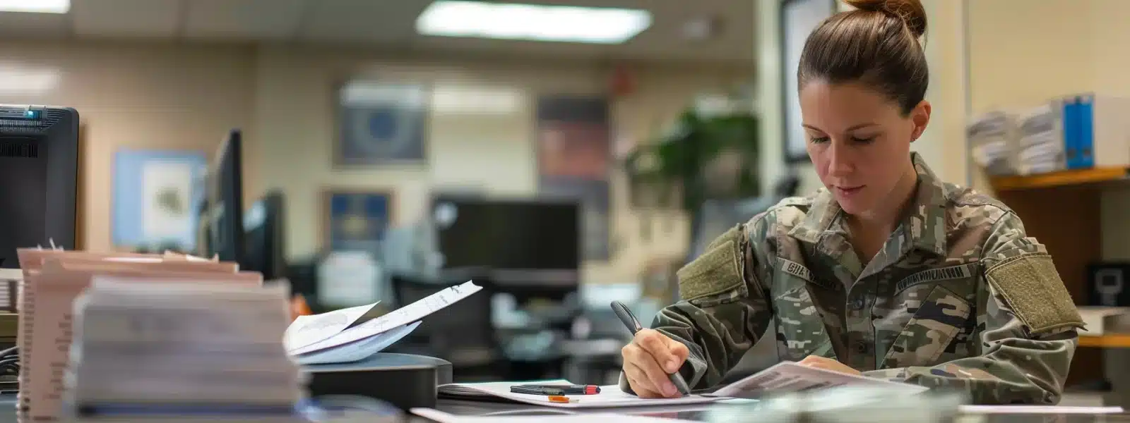 a focused, determined defense contractor reviewing access controls and authentication measures in a high-tech, secure office setting.